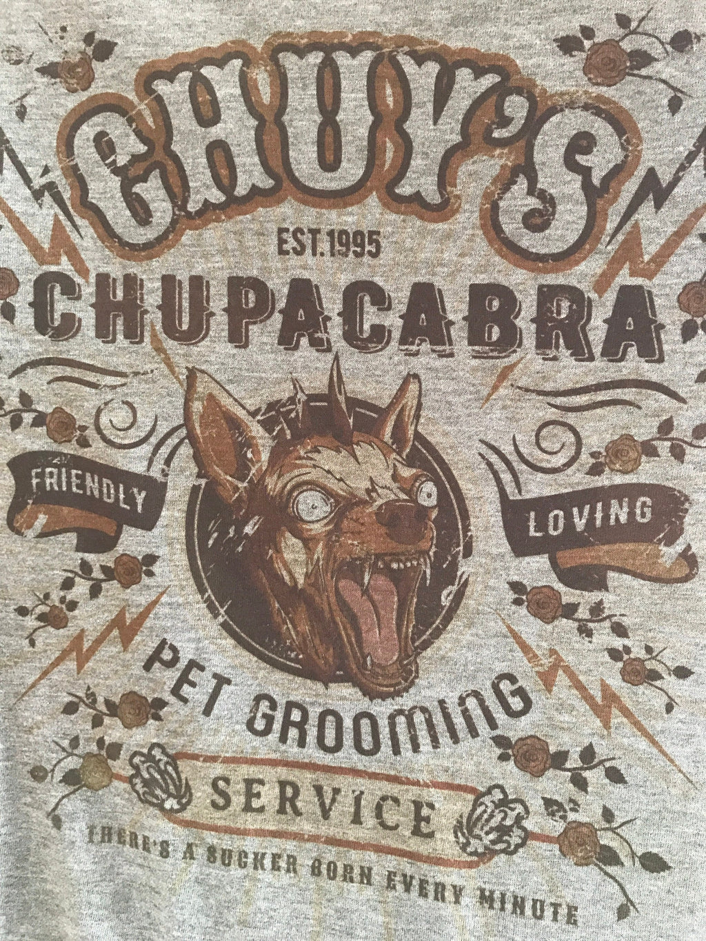 Chuy's Chupacabra Pet Grooming T-Shirt: Vintage-Style Spoof Tee